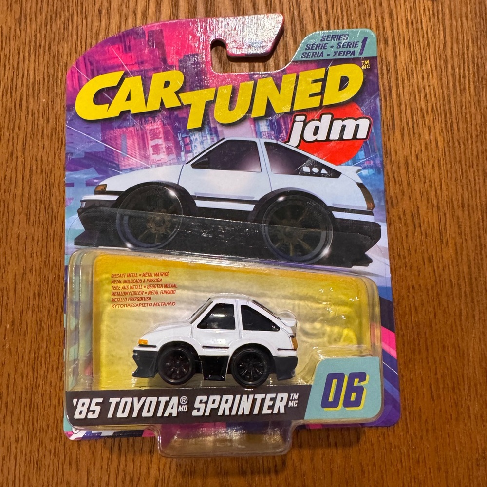 Car-Tuned JDM Series 1 diecast featuring the ’85 Toyota Sprinter AE86 (#06).